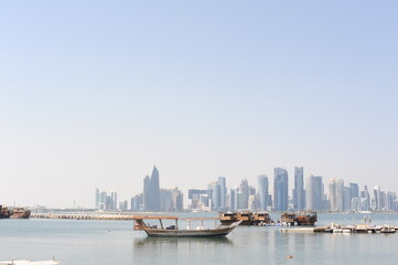Obraz premium Panoramic view of modern skyscrapers of Doha capital city cityscape on a sunny day in summer, Doha, Qatar