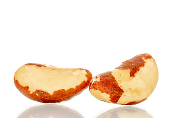 Brazil nuts without shells, macro, isolated on white background.