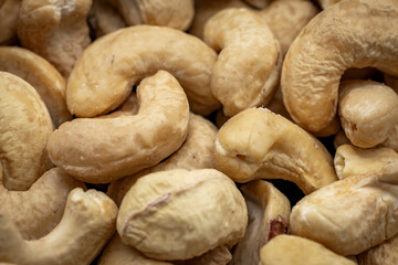 Close up of cashew nuts background. Healthy food and nutrition concept