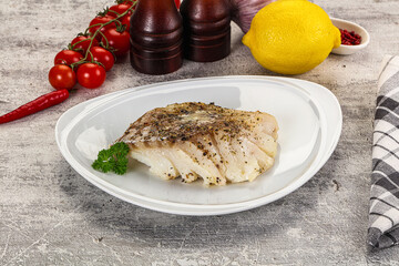 Baked cod fish fillet with spices