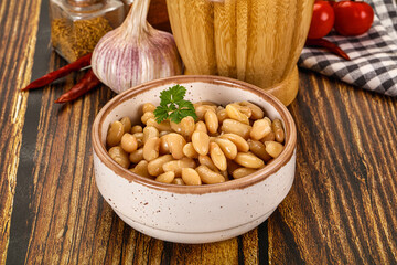 Baked white canned beans in the bowl