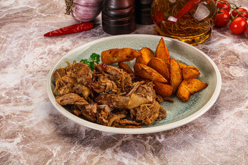 Baked shredded pork with potato