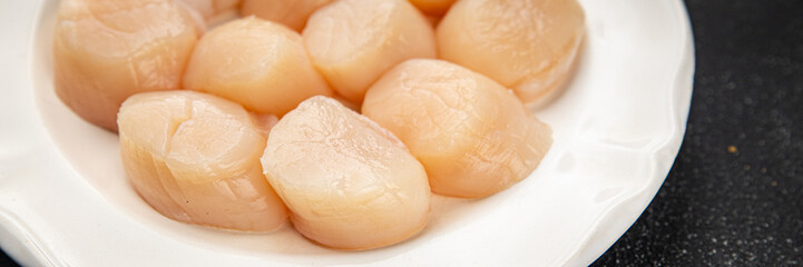 Raw sea scallop seafood fresh tasty food dish gourmet food background on the table rustic food top view copy space keto and paleo diet vegetarian  food pescetarian diet