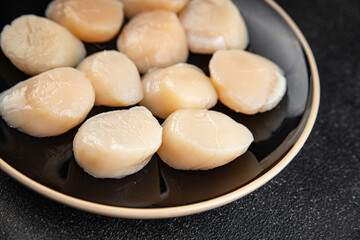 Raw sea scallop seafood fresh tasty food dish gourmet food background on the table rustic food top view copy space keto and paleo diet vegetarian  food pescetarian diet