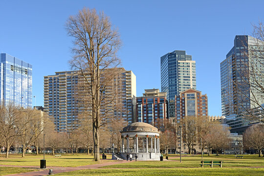 Parkman Bandstand against backdrop of urban skyscrapers, landmark bandstand located on eastern side of Boston Common in Boston, Massachusetts, United States