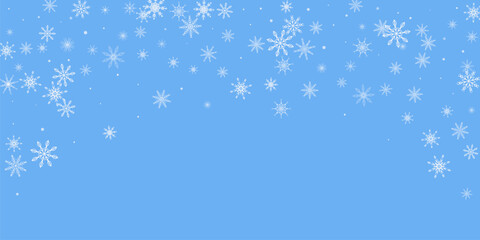 Snowflakes. Snow, snowfall. Falling scattered white snowflakes on a blue background.