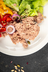 tuna salad fresh vegetables and seafood fresh tasty food dish gourmet food background on the table rustic food top view copy space keto and paleo diet Vegetarian and pescetarian diet