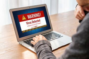 Virus warning alert on computer screen detected modish cyber threat , hacker, computer virus and malware