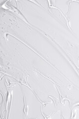 The texture of a cosmetic serum for the face with hyaluronic acid and collagen