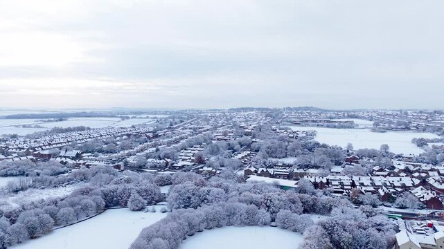Snow-covered landscape reveals serene rural beauty in winter wonderland