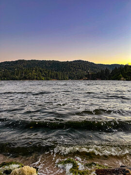 Sunset over the lake in the mountains