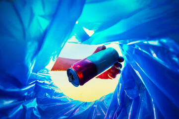 Throwing soda can. Hand Throwing tin in trash cans. Throwing bee can in trash bin. Waste sorting...
