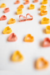 Food love concept.  Pasta hearts on the white background. 