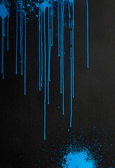 Abstract blue splashes on black background