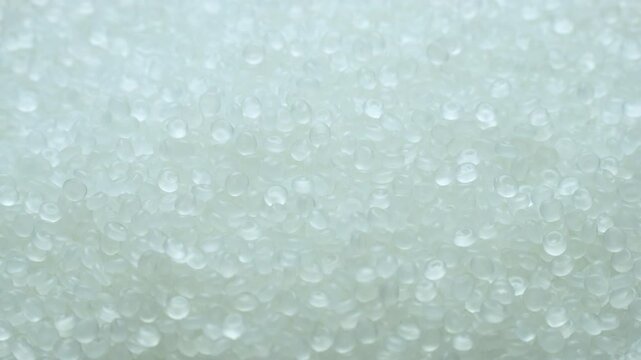Polypropylene granule close-up background texture