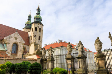 Obraz premium Poland, Krakow. Spires of St Andrews Church in distance.