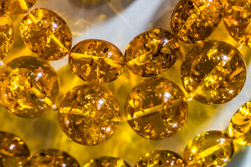 Colorful golden Baltic amber, Gdansk, Poland. Amber capital of the world. Amber 40 million years old. Found Gdansk Beaches 6000 years. Plant pollen in amber.
