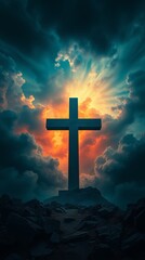 Fototapeta premium Cross silhouetted against a dramatic sunset sky.