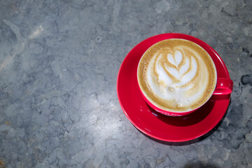 Lisbon, Portugal. Cappuccino in red cup