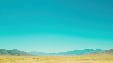Serene Landscape With Distant Mountains And Wind Turbine