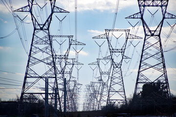 Electric Grid Large Electrical Towers, Transformers and Power Lines Running off into the Distance