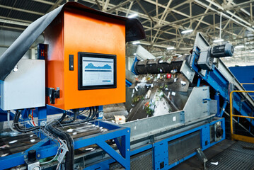 Control panel of production line in recycling plant workshop