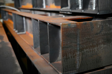 Welded fabrication made of beams stacked in plant warehouse