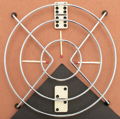 Still life with a domino bone and matches