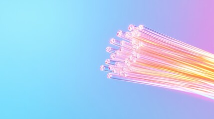 A bundle of illuminated fiber optic cables against a gradient blue and pink background, showcasing vibrant light and futuristic technology.