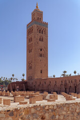 Fototapeta premium Koutoubia Mosque - largest mosque in Marrakesh, Morocco, Africa. A majestic building (tower) with a golden top. 