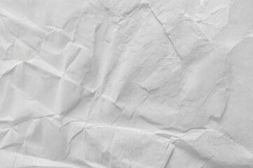 Crinkled white paper texture fills the entire background.