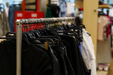 Fashion display featuring various clothing items in a trendy retail store