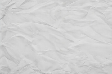 Crinkled white paper texture fills the entire background.