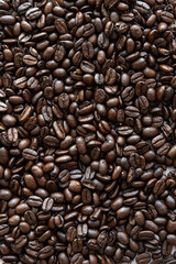 Top View of Roasted Coffee Beans, Textured background – Minimalist Design for Coffee, Food, or Beverage-Related Content and Creative Projects