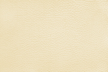 Texture of genuine leather or artificial synthetic leatherette pastel yellow color. Skin structure...
