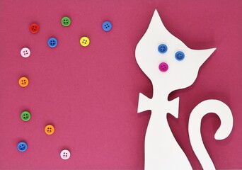 Invitation, poster, picture or card with silhouette of white cat and colorful buttons on purple-pink background