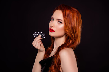 Fototapeta premium Photo of stunning lovely girl model hold casino chips dressed dress isolated on black color background