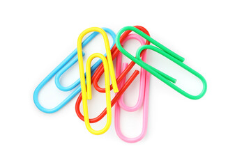 Many colorful paper clips isolated on white, top view