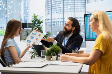 Financial advisor developing budget for clients, managing their expenses and savings. Agent helping...