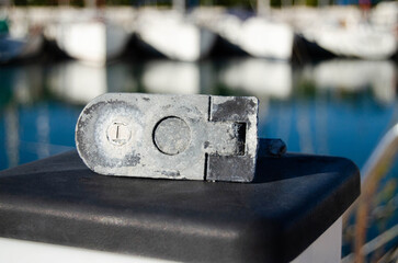 The old boat leverlock is damaged by the aggressive marine environment