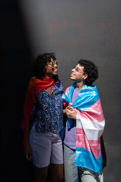 Multiethnic LGBTQ+ couple sharing a joyful moment together