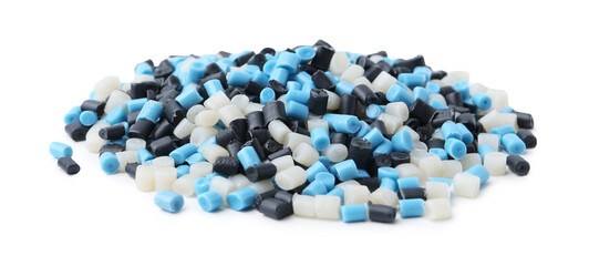 Pile of colorful plastic granules isolated on white