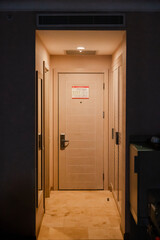 Door in hotel room, mood light, escape route