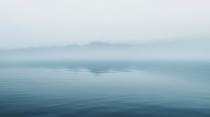 Fototapeta premium A cool misty morning gradient background.featuring soft grays and blues with mist effects.emphasizing tranquility and freshness.Ideal for wellness blogs, serene visuals, and calming designs