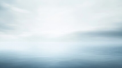 Fototapeta premium A cool misty morning gradient background.featuring soft grays and blues with mist effects.emphasizing tranquility and freshness.Ideal for wellness blogs, serene visuals, and calming designs