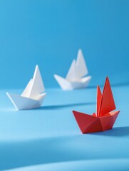 Red boat is the only one in a row of three white boats. The red boat is the only one that is not folded