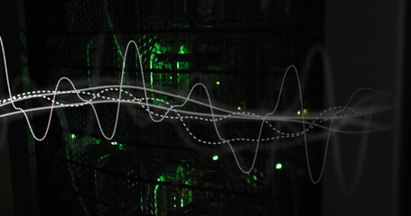 Waveform image over green-lit server racks in data center