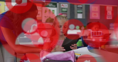 Image of icons over diverse schoolgirl and teacher using laptop