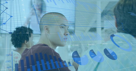 Image of charts processing data over diverse creatives having business image call