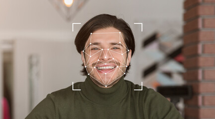 A smiling individual is displayed within a digital facial recognition framework, showcasing advanced identification technology. The setting suggests a modern environment focused on innovation.